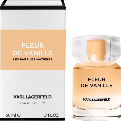 A white and beige perfume box with Karl Lagerfeld branding and a clear glass bottle of Fleur de Vanille perfume.