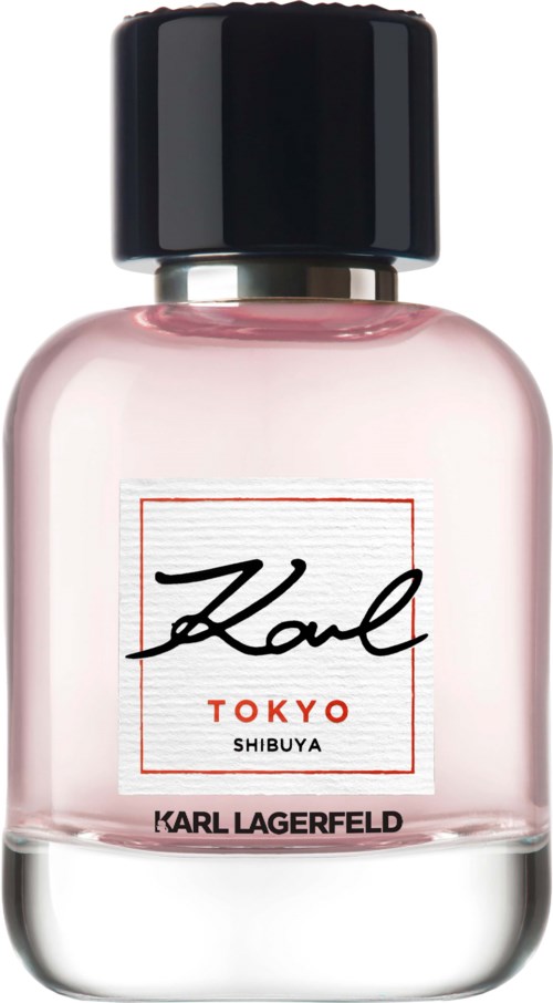 Ein Parfümflasche mit rosa Flüssigkeit, schwarzem Deckel und Labels für Karl Lagerfeld und Karl Tokyo Shibuya.