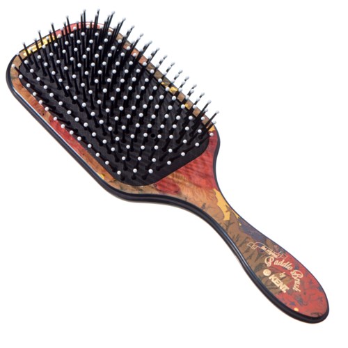 A hairbrush with a decorative wooden handle and black cushion filled with white-tipped metal bristles.