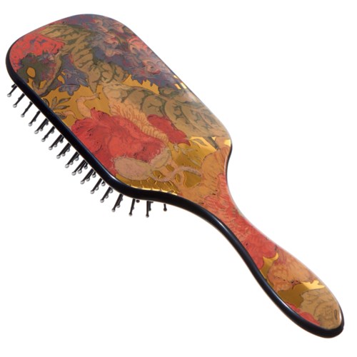 A hairbrush with a colorful, abstract pattern on the top and black handle, metal bristles.