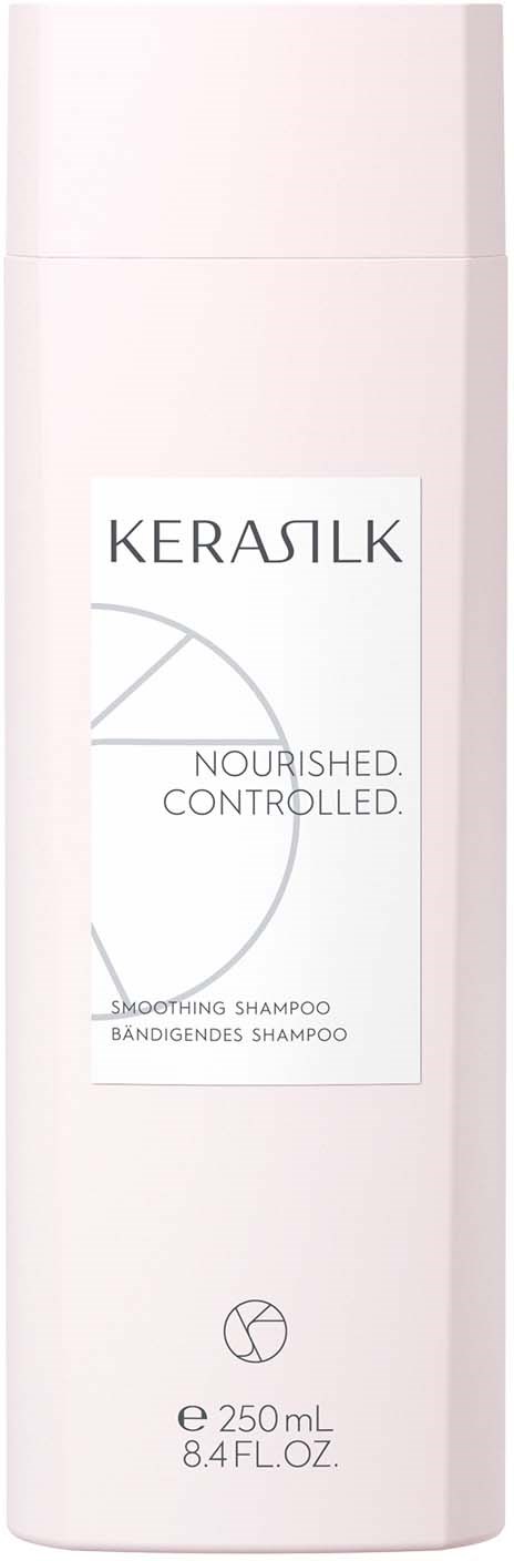 Eine hohe, hellrosa Shampoo-Flasche mit einem Etikett, auf dem 'KERASILK' steht. Sie ist 250 ml groß und glättet Haare.
