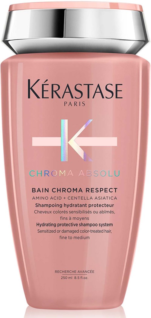Roze shampoo fles met zilveren dop, bevat Kérastase Chroma Absolu voor gekleurd haar dat gevoelig of beschadigd is.