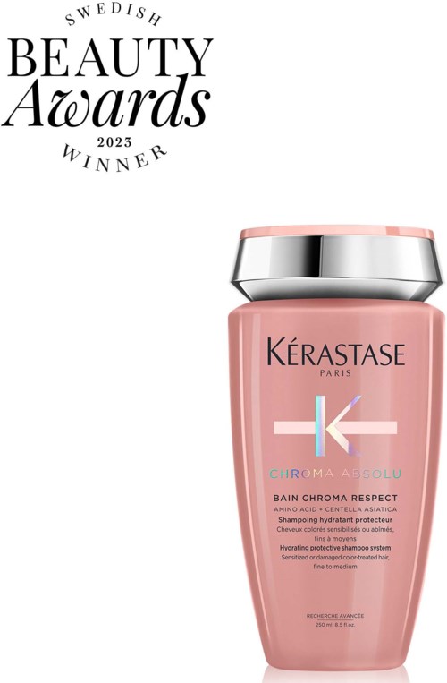 Een roze shampoofles met zilveren dop, labeled Kerastase Chroma Absolu, winnaar bij Swedish Beauty Awards 2023.