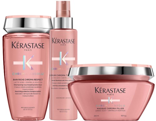 Set van drie roze haar- en huidverzorgingsproducten van Kérastase, inclusief shampoo, serum en masker.