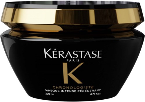 Een zwarte pot met een gouden deksel, gelabeld Kérastase Paris, bevat haarbehandelingsmasker.