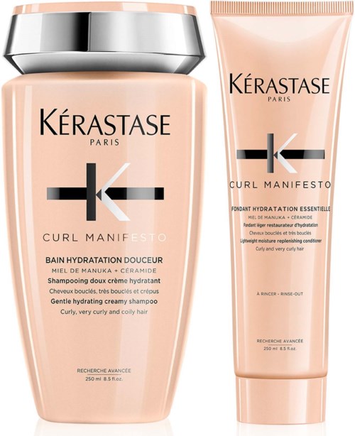 Twee haarverzorgingsproducten, een crèmeshampoo en een leave-in voor hydratatie, voor krullend, zeer krullend en coily haar.