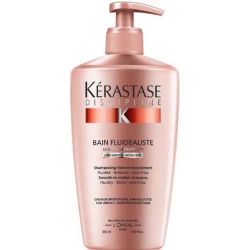 Schampoflaska med pump, rosa färg, märket "Kérastase" och produkten "Bain Fluidealiste."