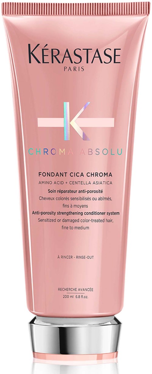 Roze tube met Kerastase haarproduct met zilveren dop, gemarkeerd Chroma Absolu, voor beschadigd of gevoelig haar.