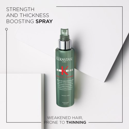 A green spray bottle labeled Kerastase Paris for hair strength and thickness, with text highlighting benefits for weakened hair.