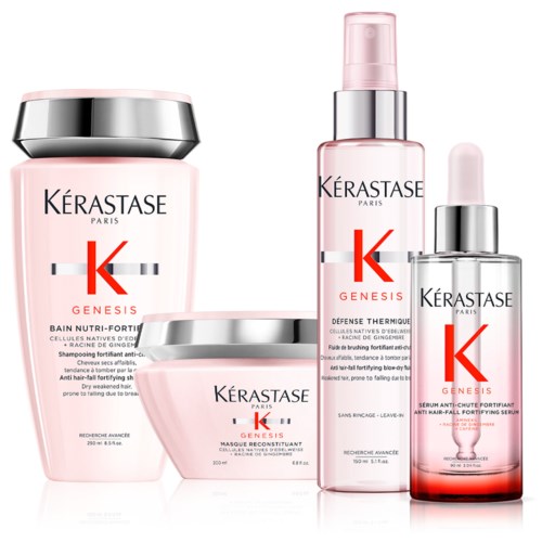 En serie med hår- og hudpleieprodukter i elegante rosa og sølv beholdere, merket Kérastase Genesis.