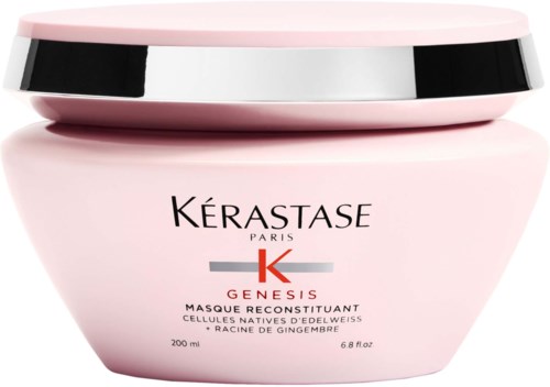 Een roze potje met Kerastase Genesis haarmasker, zilveren deksel en zwart label, 200 ml.