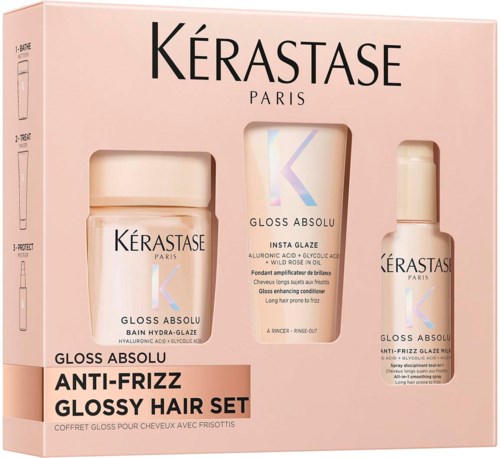 Haarpflegeset namens Gloss Absolu mit Shampoo, Glasur und Spray für krauses und glänzendes Haar.