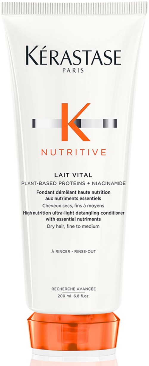 Een witte buis met oranje dop gemerkt 'Kérastase Nutritive Lait Vital' voor haarconditioner.