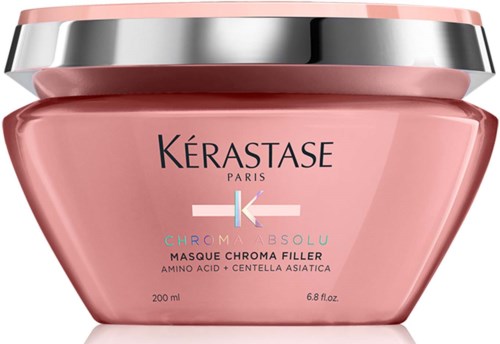 Roze potje van Kérastase Chroma Absolu haarmasker met zilveren deksel.