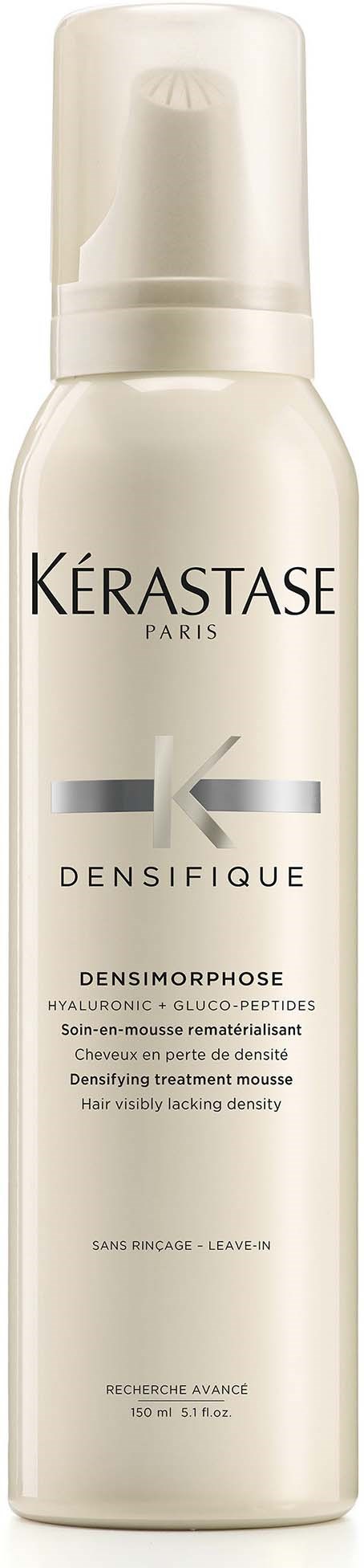 Een witte fles Kérastase Densifique haarbehandeling met pomp.
