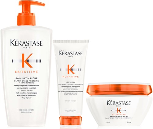 Ein Set Haarpflegeprodukte einschließlich Shampoo, Conditioner und Haarkur aus der Kerastase Nutritive Linie.