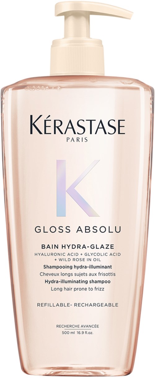 A pinkish shampoo bottle with a pump, labeled Kérastase Gloss Absolu, Hydra-Glazing, and details in small print.