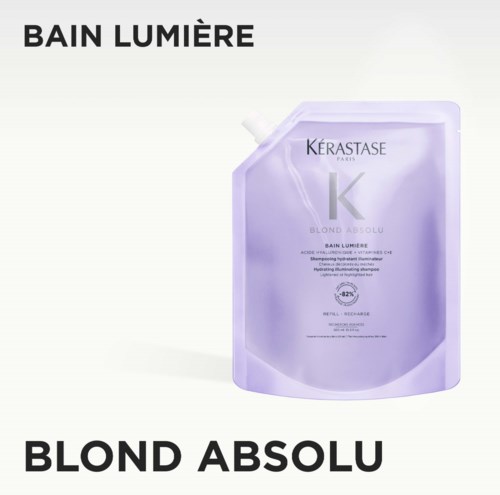 Een paarse haarshampoo-verpakking met de merknaam Kerastase en productnaam Blond Absolu.