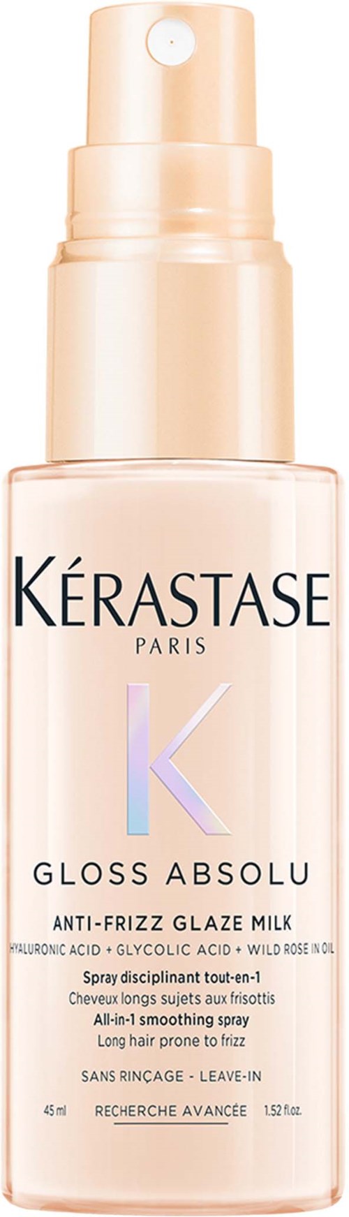 A bottle of Kérastase Gloss Absolu anti-frizz hair serum with a pump dispenser.