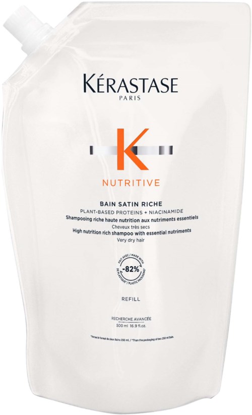 Witte navulfles voor shampoo met oranje en zwarte tekst voor Kérastase Nutritive.