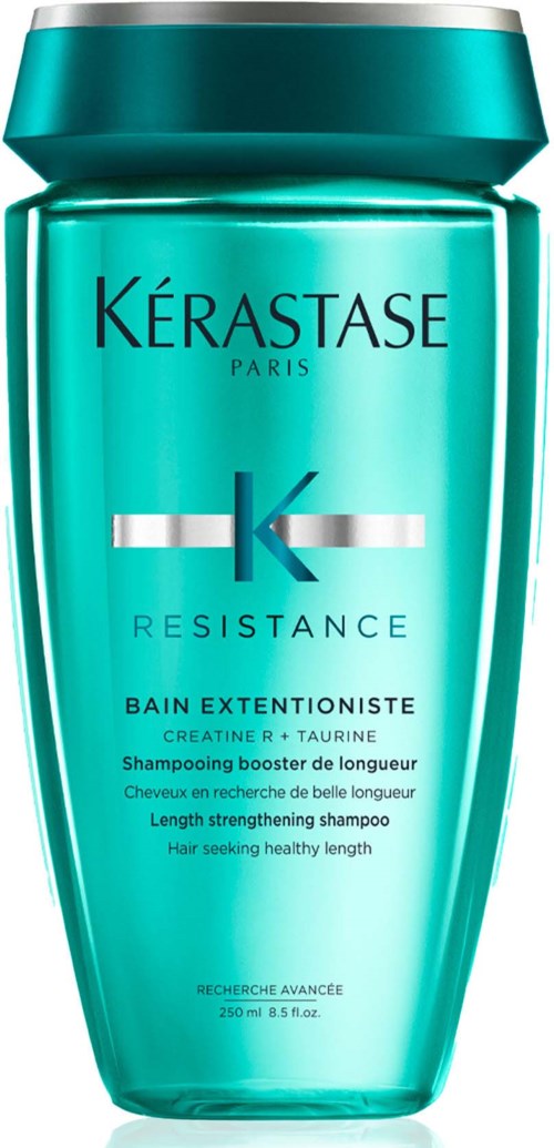 Een turquoise shampoo fles met zwarte en zilveren tekst, gemarkeerd als Kerastase Resistance Length versterkende shampoo.