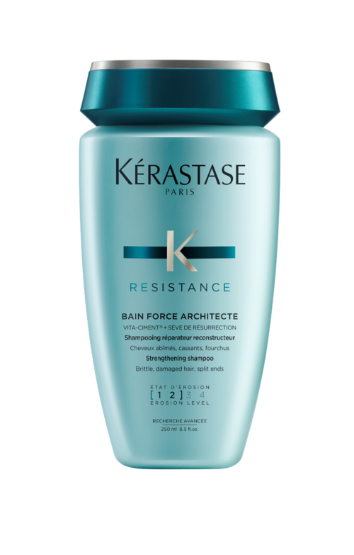 Een turquoise flesje met het label 'Kérastase Resistance Bain Force Architect' voor haarverzorging, met zilveren deksel en minimalistisch ontwerp.