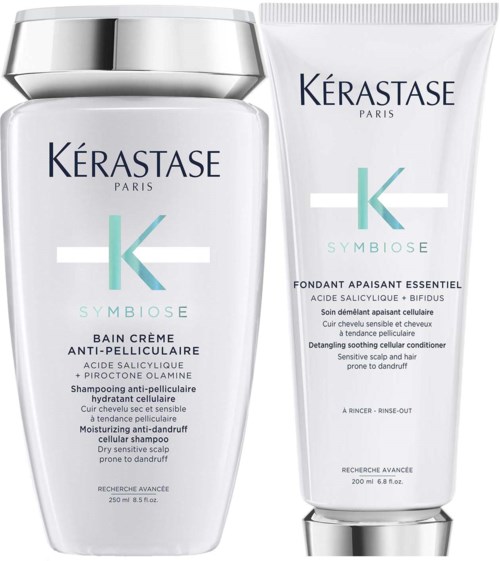Zwei Haarpflegeprodukte von Kérastase, eines ist ein Schuppen-Shampoo und das andere eine Kopfhaut beruhigende Behandlung.
