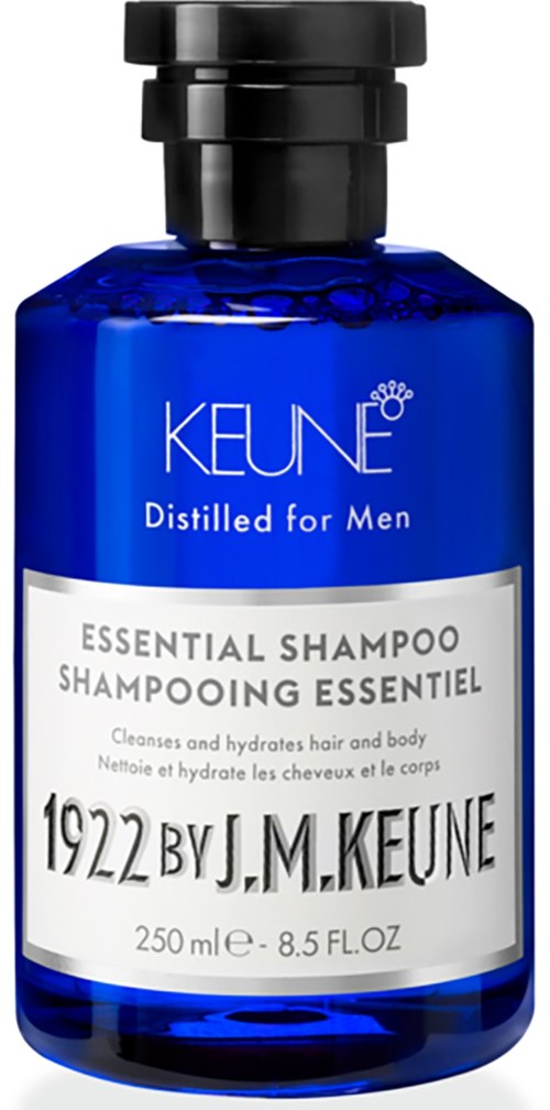 A blue bottle of Keune men's shampoo with white and black label, stating it cleans and hydrates hair and body.
