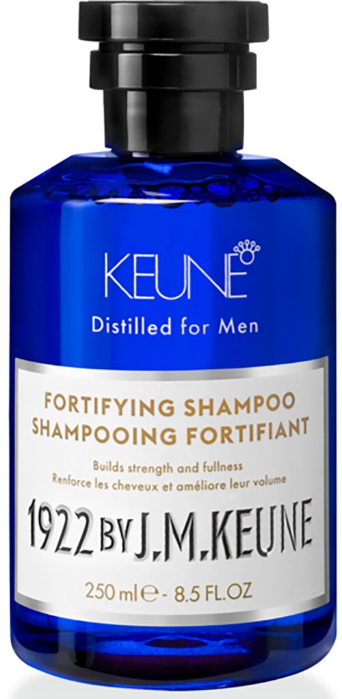 A blue bottle of Keune fortifying shampoo for men, with black cap and white and gold label.