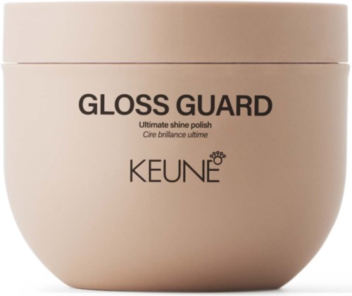 Dit is een ronde, lichte container van KEUNE GLOSS GUARD glanspoeder met zwarte tekst. Geen andere voorwerpen zijn zichtbaar.