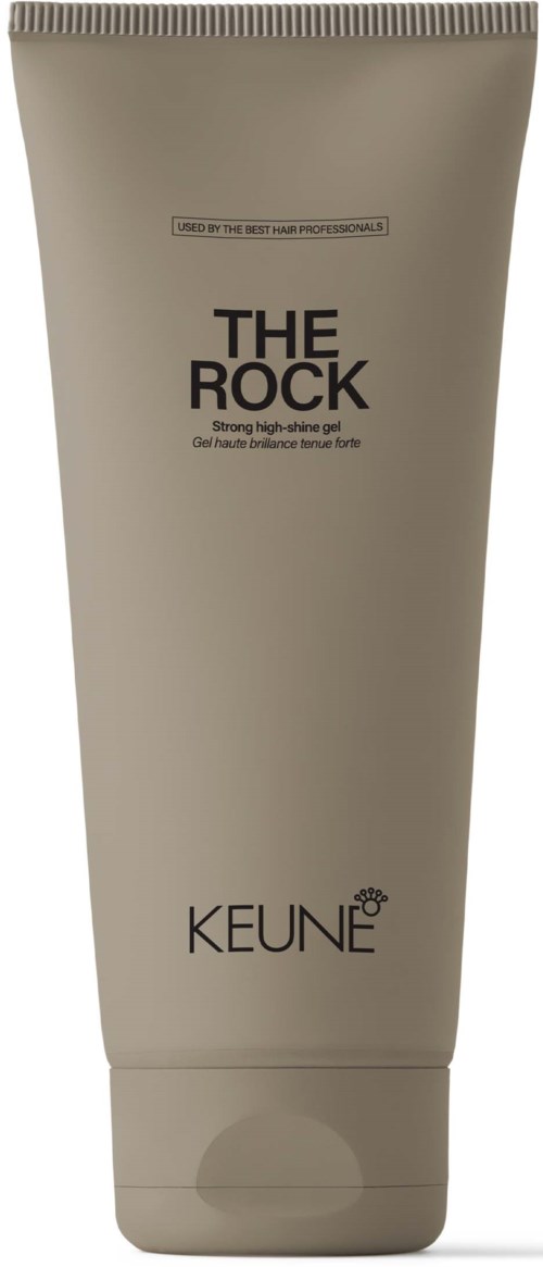 Beigen värinen putki, jossa on musta teksti "THE ROCK" ja "KEUNE," todennäköisesti hiusten tai ihonhoitotuote.