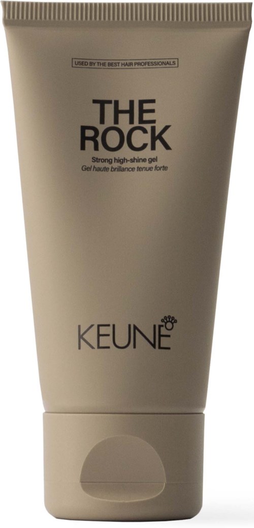 Beige-tuubi, jossa lukee 'The Rock' Keunelta, tarkoitettu hiusgeelille, mustakantinen.
