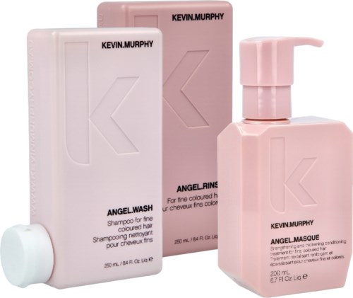 Pinkfarbene Flaschen und ein weißer Verschluss, beschriftet mit Kevin Murphy und Haarpflegeprodukten.