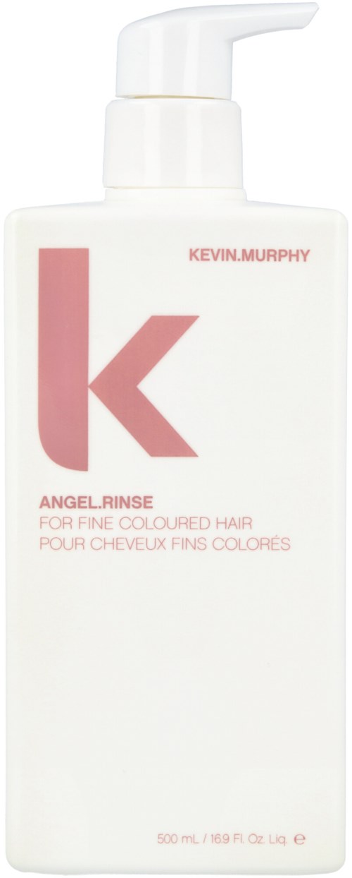 En vit flaska med pump, märkt 'Kevin Murphy Angel Rinse' för färgat hår.