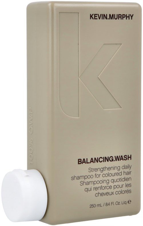 Een beige fles Kevin Murphy balancing wash shampoo met witte dop en zwarte tekst op het etiket.