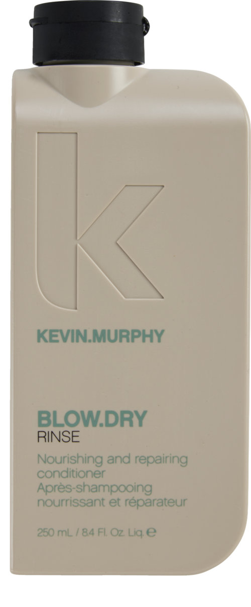 Beige pullo, jossa musta korkki, merkinnällä 'Kevin.Murphy Blow.Dry Rinse', käytetään hiustenhoitoon.