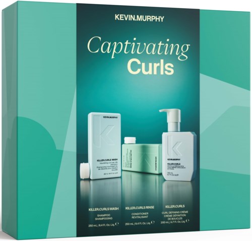Product packaging for Kevin Murphy Captivating Curls hair products, including shampoo, conditioner, and curl cream.