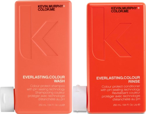 Two red bottles with black text, one for shampoo and one for conditioner, branded Kevin Murphy. They are both 250 ml.