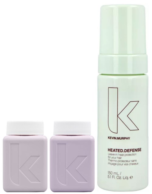 To flasker merket 'Kevin Murphy' og en sprayflaske, sannsynligvis hårpleieprodukter.
