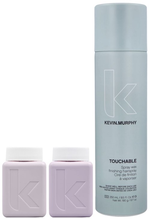 En lyseblå sprayflaske merket 'Kevin Murphy Touchable' og to rosa flasker med bokstaven 'K' på.