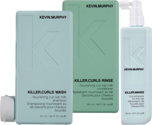 Three hair care products: shampoo, conditioner, and curl moisturizer, all from Kevin Murphy, with light green and white packaging.