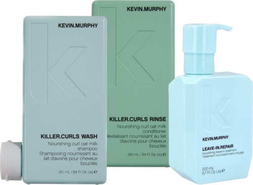 Drei Flaschen Kevin Murphy Haarpflegeprodukte: Shampoo, Conditioner und Leave-in-Reparationsspray. Alle sind pastellblau und grün.