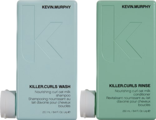 Two green bottles labeled Kevin Murphy, one for shampoo and one for conditioner, with simple text and a large 'K' logo.