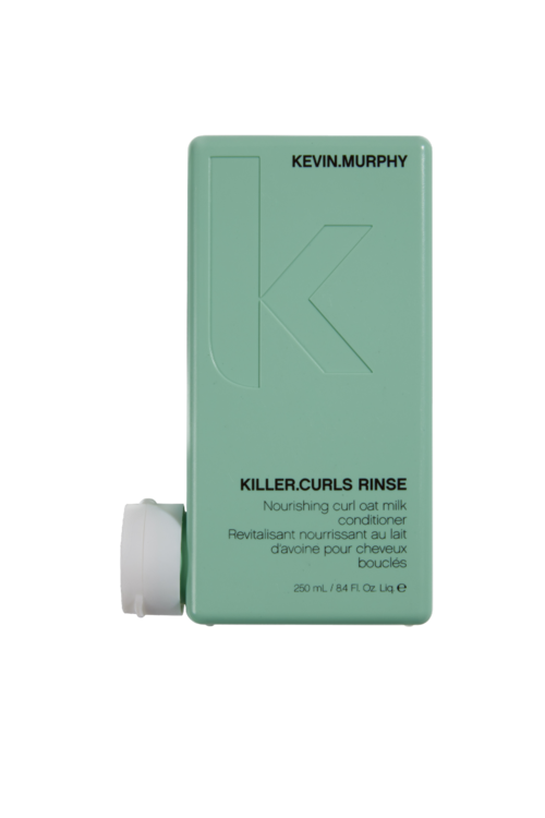 Eine mintgrüne Flasche mit der Aufschrift Kevin Murphy Killer Curls Rinse, eine nährende Lockenpflege, mit weißem Deckel an der Seite.