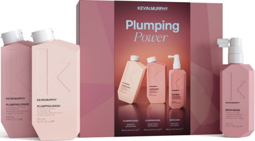 Set of four pink Kevin Murphy hair products including shampoo, wash, body mask, and a display box with branding.