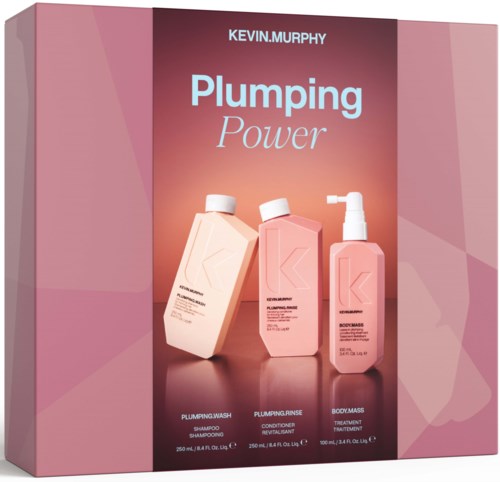 Display of Kevin Murphy Plumping Power hair care set with shampoo, conditioner, and body mass treatment bottles.