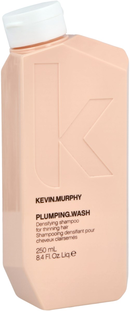 A pink bottle of Kevin Murphy Plumping Wash shampoo, 250 ml, with a white cap.