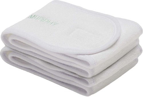 Three folded white towels with the word MULLINY embroidered on one towel.