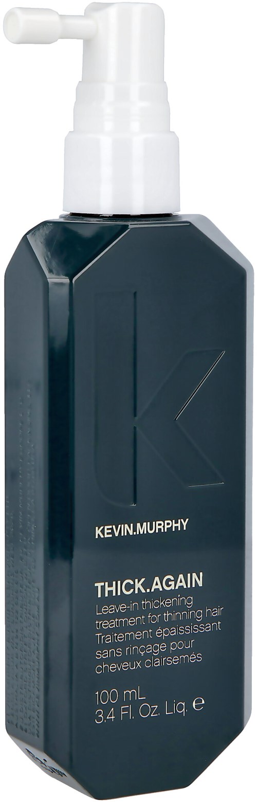Eine dunkelblaue Flasche mit weißem Pumpenlabel Kevin Murphy Thick Again zur Haarstyling.