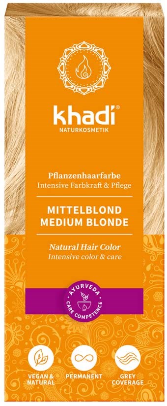 Pakken viser en medium blond hårfarge fra Khadi, med naturlige, veganske og permanente egenskaper, og en lilla sertifiseringsmerke.